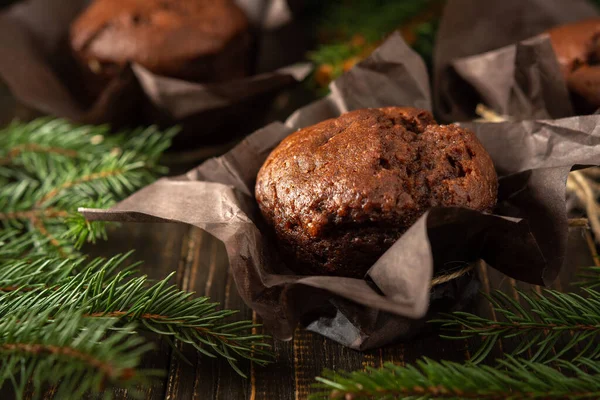 Delicious Chocolate Muffins Dark Wooden Background Fir Branches Merry Christmas — Stock Photo, Image