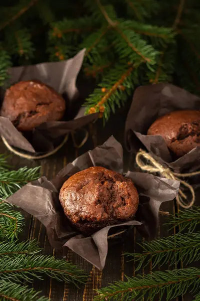 Delicious Chocolate Muffins Dark Wooden Background Fir Branches Merry Christmas — Stock Photo, Image