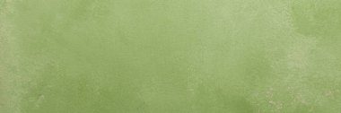 Açık yeşil bir yüzey farklı dokular ve küçük noktalarla görülebilir. Düzensiz bir şablonu var ve sağlam bir arkaplan ya da afiş olarak kullanılabilir.
