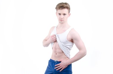 Genç bir adam. Sağlıklı bir yaşam tarzı. Beyaz arka plan.