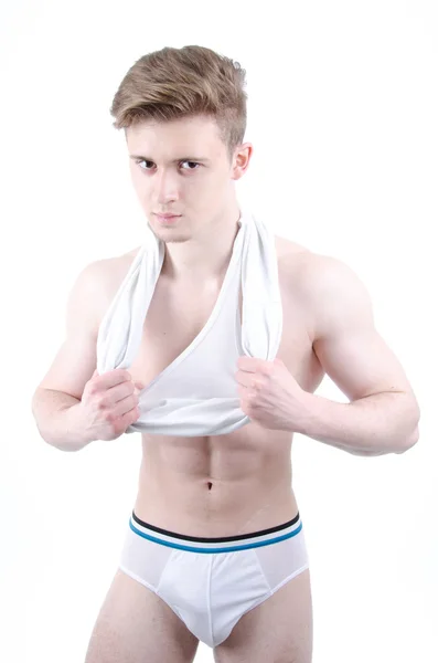 Young man undressing. — Stock Photo, Image