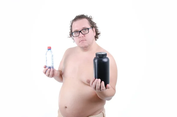 Fat guy and sports nutrition. — Stock Photo, Image