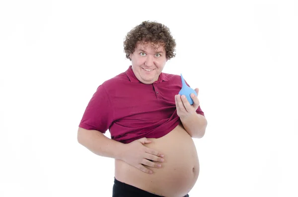 Fat Man met een klysma. — Stockfoto