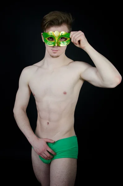 Young sexy guy in the mask. — Stock Photo, Image