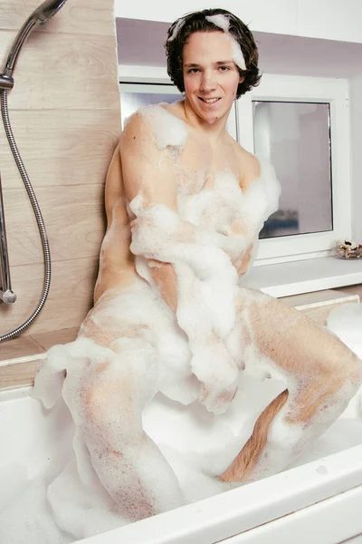 Young Attractive Guy Resting Bathtub Foam — Stock Photo, Image