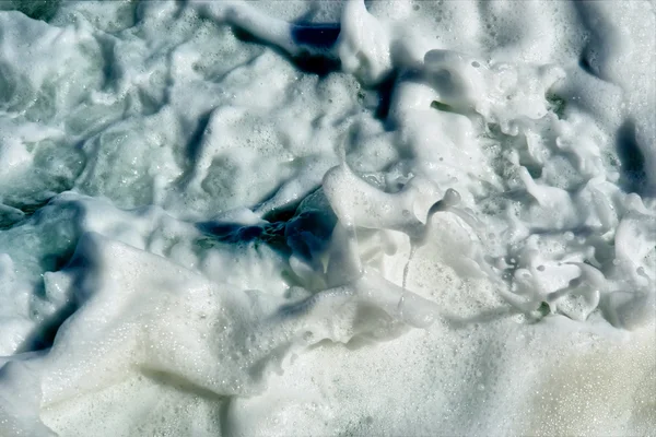 Espuma marina en luz diurna —  Fotos de Stock