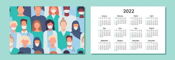 Yatay takvim 2022. Doktorlar. - Mutlu yıllar. Masa başı masası takviminde tıbbi personel, doktorlar, maskeli hemşireler var. Farklı milletlerden insanlar. Çok ırklı, çok kültürlü bir toplum.