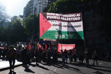 Buenos Aires, Argentina; Oct 7, 2025: protest in support of Palestine, against the Israeli zionist violence in Gaza. Banner: Stop the genocide of the Palestinian people. Down with imperialism!