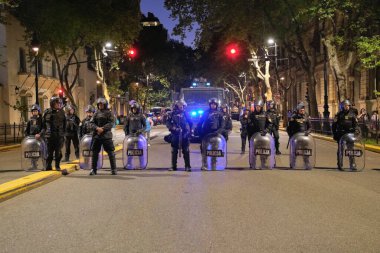 Buenos Aires, Argentina; Oct 7, 2025: protest in support of Palestine marking two years since the intensification of the Israeli Zionist genocide in Gaza. Group of police officers near the protesters.