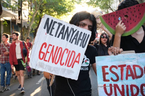 Buenos Aires, Argentina; October 7, 2025: massive protest in support of Palestine marking two years since the intensification of the Israeli Zionist genocide in Gaza. Sign: Netanyahu genocidal.