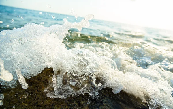 Onda do oceano ao pôr-do-sol — Fotografia de Stock