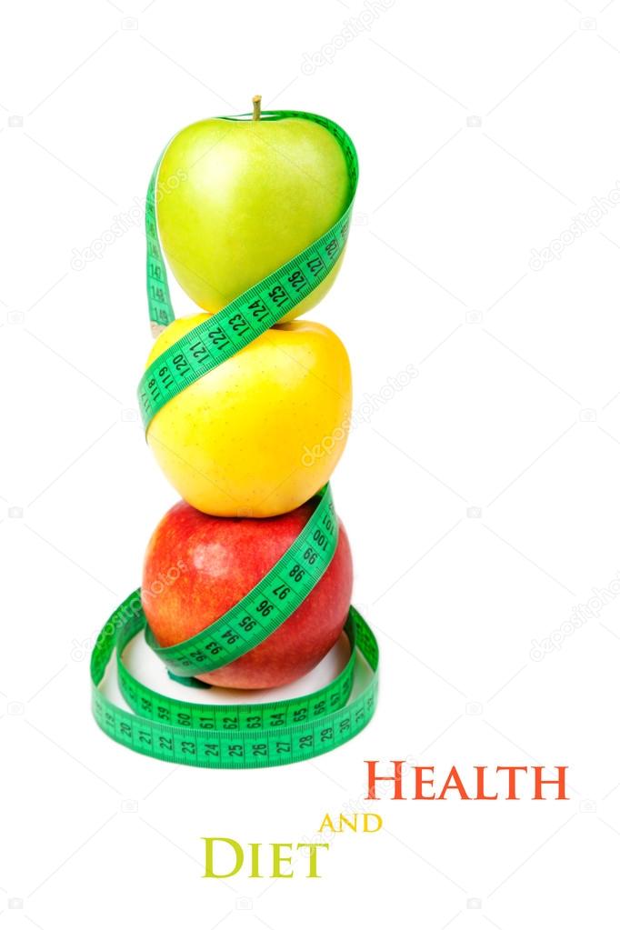 Three apples with measuring tape on a white background