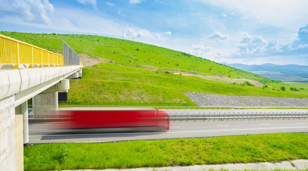 Truck speeding transport on a highway — Stock Photo, Image