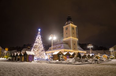 Brasov Council Square and House in the old medieval town on a winter night