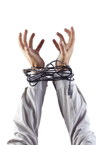 Mãos atadas com cabos Imagem De Stock