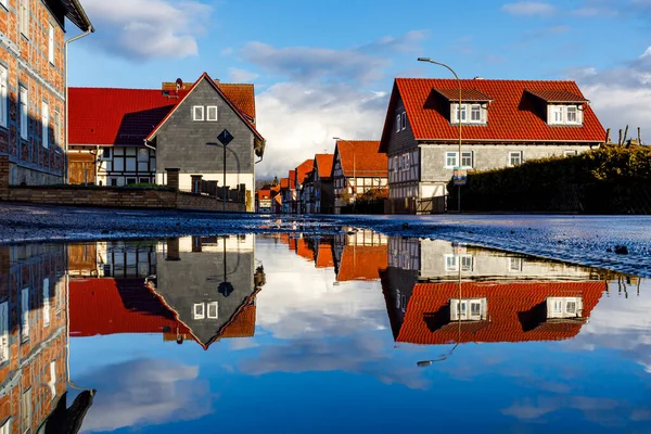 Reflection of houses at Herleshausen in Hesse Germany