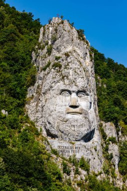 The statue of Decebal Rex at the Danube River in Romania clipart