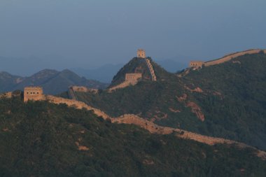 The Chinese Wall at Jinshanling with Sunrise early in the Morning clipart