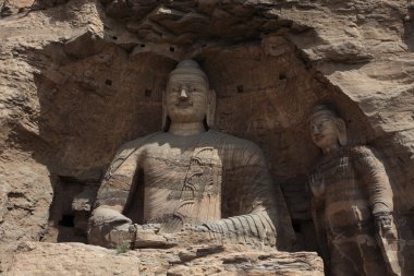 Buddhas of the Yungang Cave Monastery of Datong in China clipart