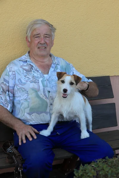 Grandfather with a small Terrier Dog — Stock Photo, Image