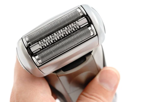Máquina de afeitar eléctrica sobre fondo blanco —  Fotos de Stock