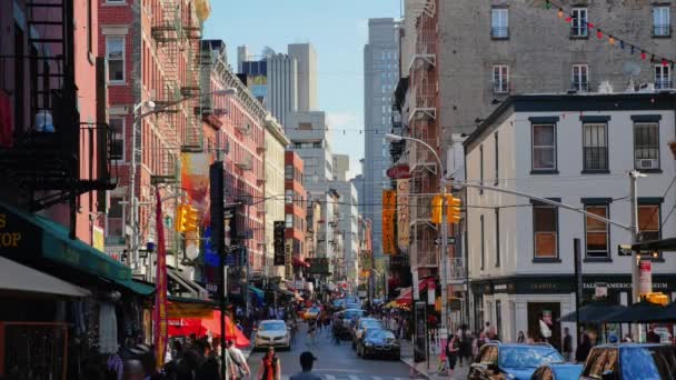 A close up of a busy city street with Chinatown in the background — Stock Video