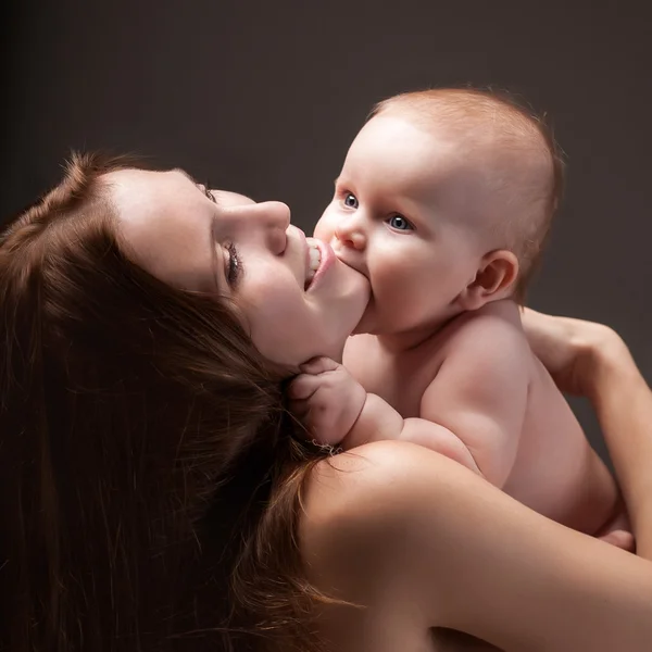 Baby biting — Stock Photo, Image