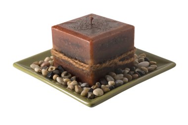 Plaka taşlarla - sönük mum