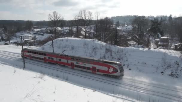 Train slow motion on snowy railway. — Stock Video