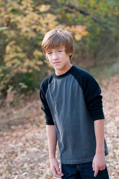 Portrait of sad teen boy outdoors — Stock Photo, Image