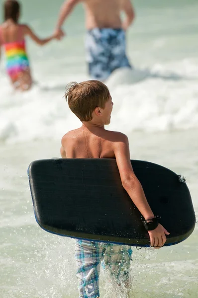 Little boy boogie boarding — Stock Photo, Image