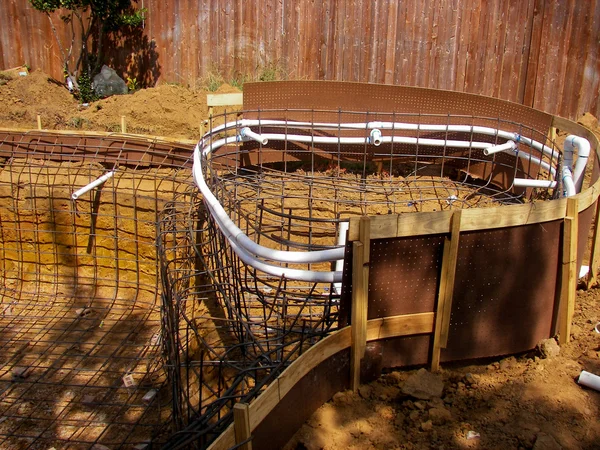 Backyard pool construction with spa — Stock Photo, Image