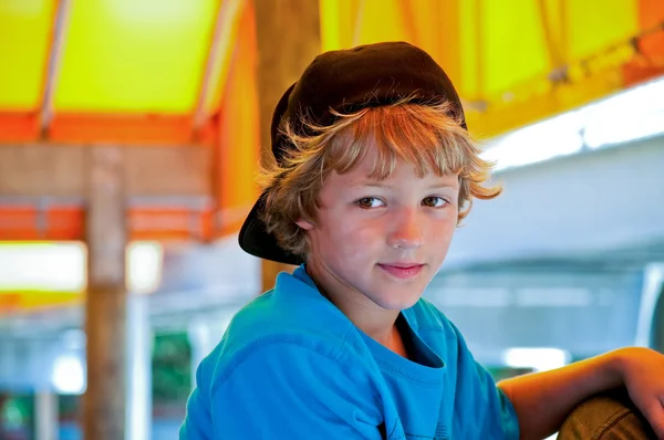 Adorable portrait of cute boy with backwards hat. — Stock Photo, Image