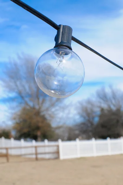 Close up of one string light bulb — Stock Photo, Image