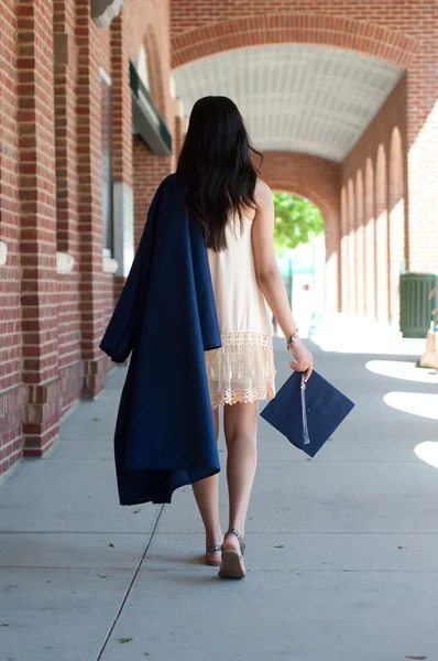 High school Graduate girl walking — Stock Photo, Image