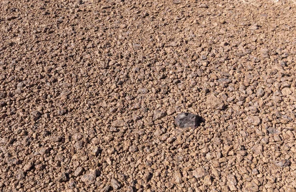太陽系の初期の宇宙空間で小惑星として形成された岩石の一つであるコンドライト隕石 この隕石はアタカマ砂漠の地球に影響を与える隕石の落下に由来します — ストック写真