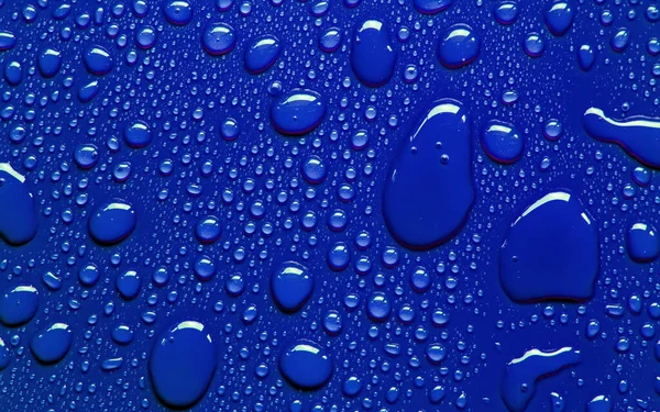 Druppels Water Blauwe Achtergrond — Stockfoto