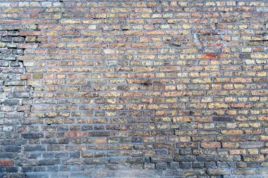 Arkaplan olarak eski tuğlaların duvarı