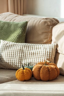 Autumn Sofa Styling with Textured Pillows, Fabric Pumpkins, and Cozy Blankets