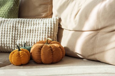 Autumn Sofa Styling with Textured Pillows, Fabric Pumpkins, and Cozy Blankets