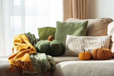 Autumn Sofa Styling with Textured Pillows, Fabric Pumpkins, and Cozy Blankets
