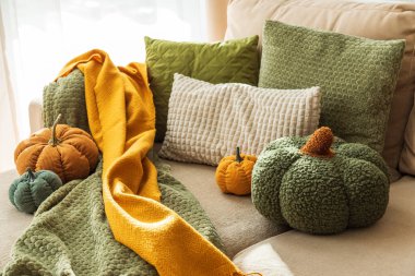 Autumn Sofa Styling with Textured Pillows, Fabric Pumpkins, and Cozy Blankets
