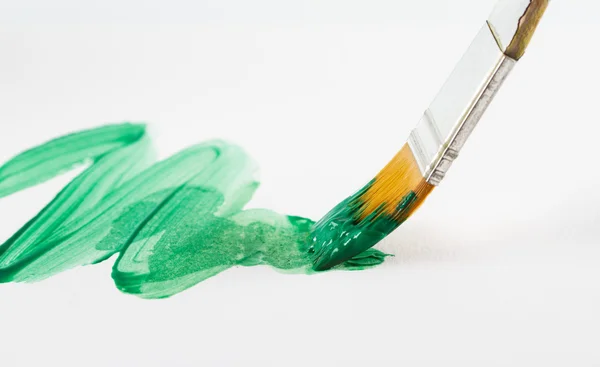 Paint brush with green paint — Stock Photo, Image