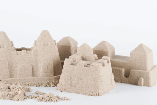 Sandcastle beyaz arka plan üzerinde — Stok fotoğraf