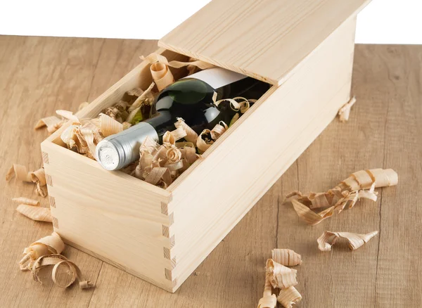 Botella en caja de madera — Foto de Stock