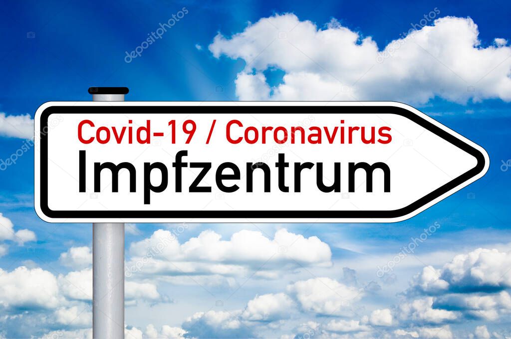 Road sign with medical touchscreen and the german word for covid-19 vaccination center or centre - impfzentrum isolated