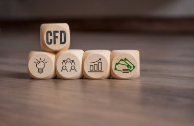 Cubes, dice or blocks with acronym CFD - Contracts For Difference on wooden background clipart