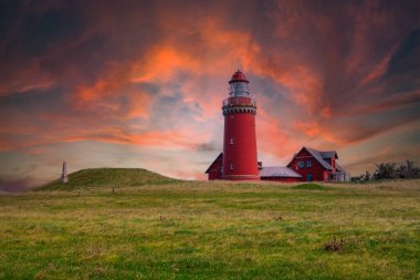 Different vacation impressions from denmark west coast with lighthouse, boats, dunes, footpath, windmills