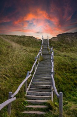 Different vacation impressions from denmark west coast with lighthouse, boats, dunes, footpath, windmills