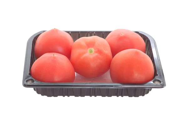 Tomaten in schwarzer Plastikverpackung — Stockfoto